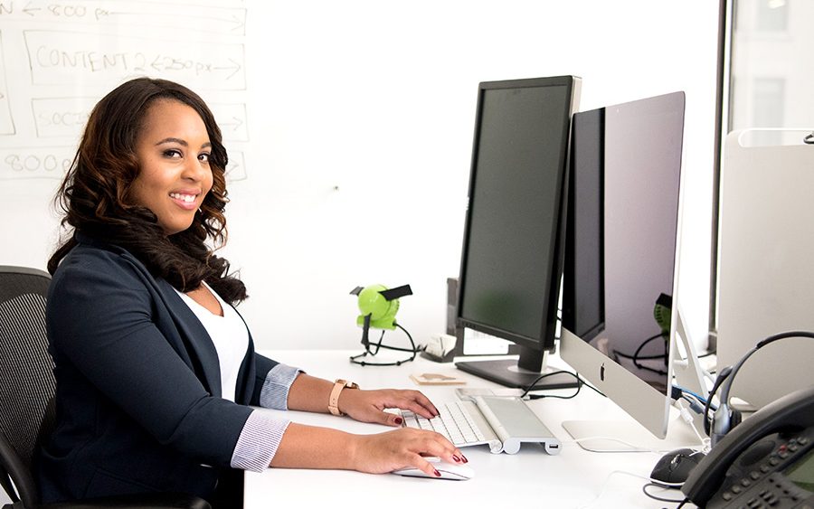 Woman working at a computer